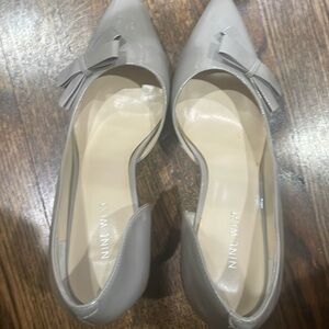 Grey patent leather pumps